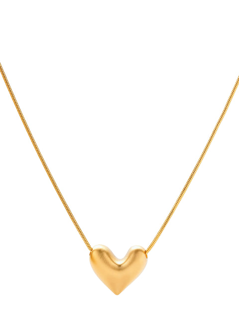 Dainty 18K gold-plated sterling silver necklace with small heart pendant on delicate chain against cream background.