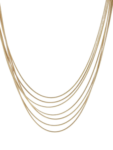 Seven delicate gold-plated snake chains create an elegant layered necklace on a neutral background.