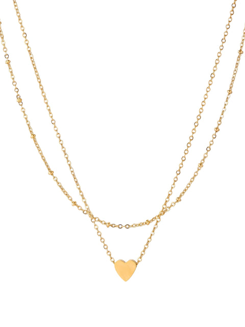 Delicate double-chain gold necklace with tiny heart pendant on cream background
