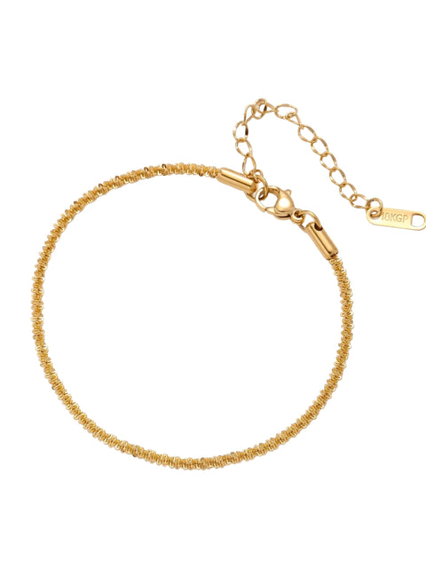 Delicate 18K gold-plated stainless steel bracelet with textured beaded chain on cream background