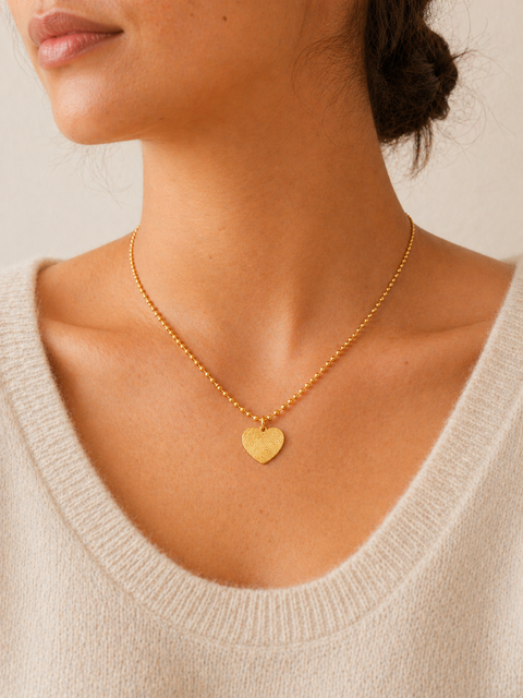 engraved-fingerprint-heart-necklace-with-beaded-chain - model