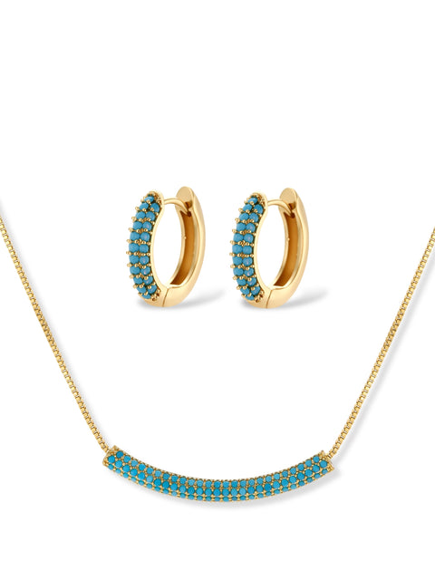 Gold-plated curved necklace and hoop earrings with turquoise cubic zirconia stones on white background.